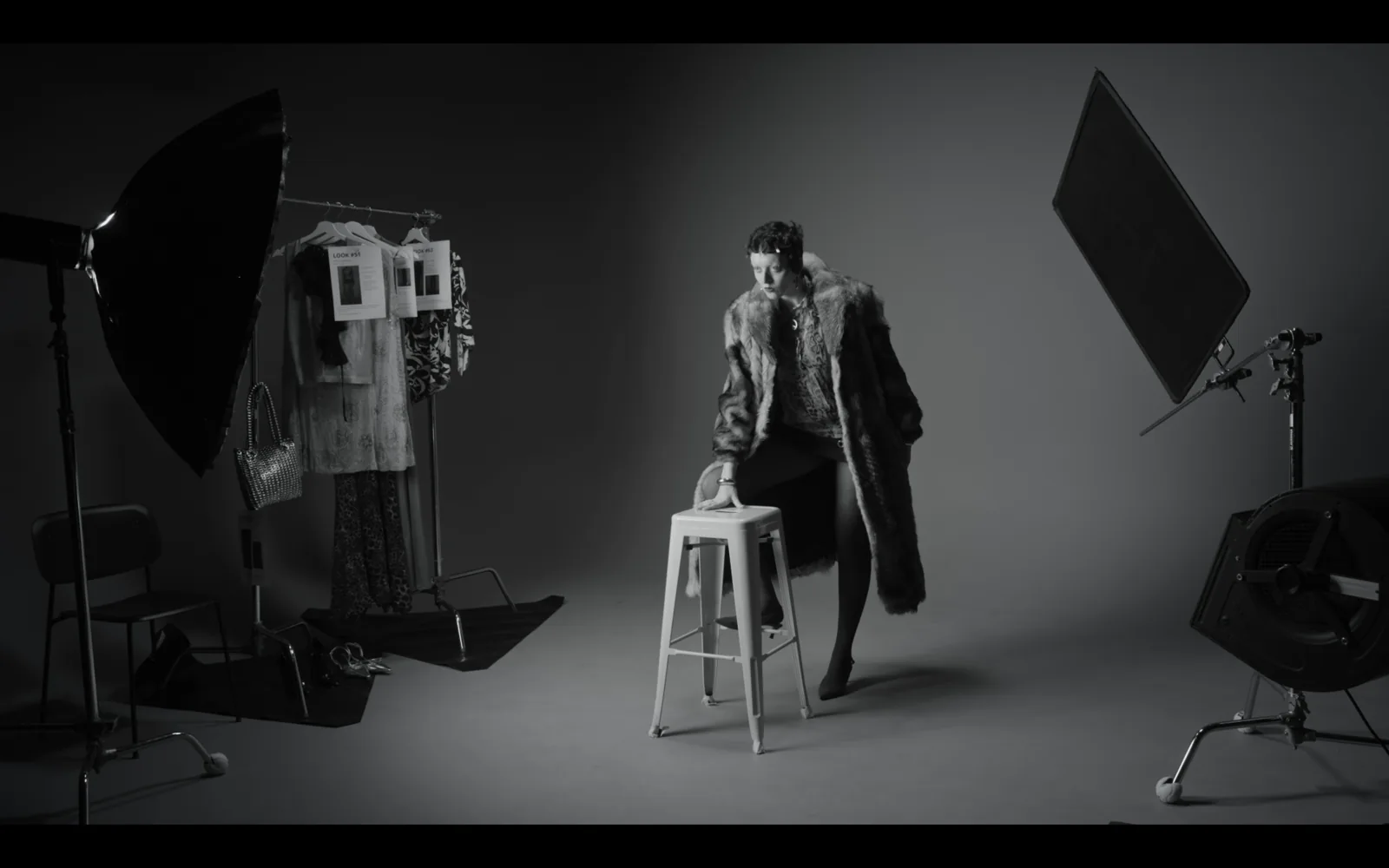 Black and white figure on set, Smile, Now!
