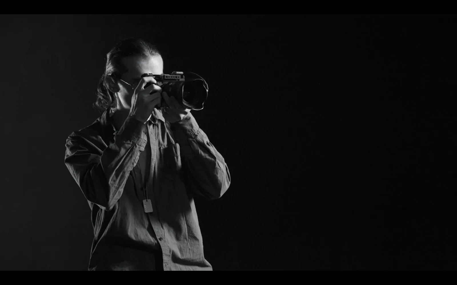 Operator with film camera in frame, Smile, Now!