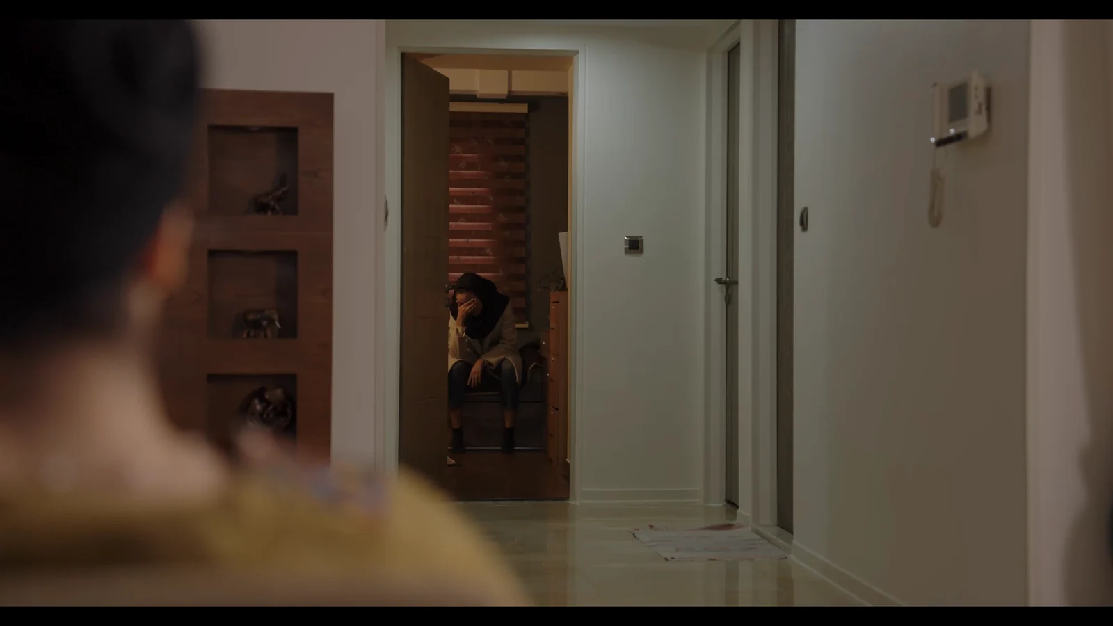 Interior hallway scene from The Transfer